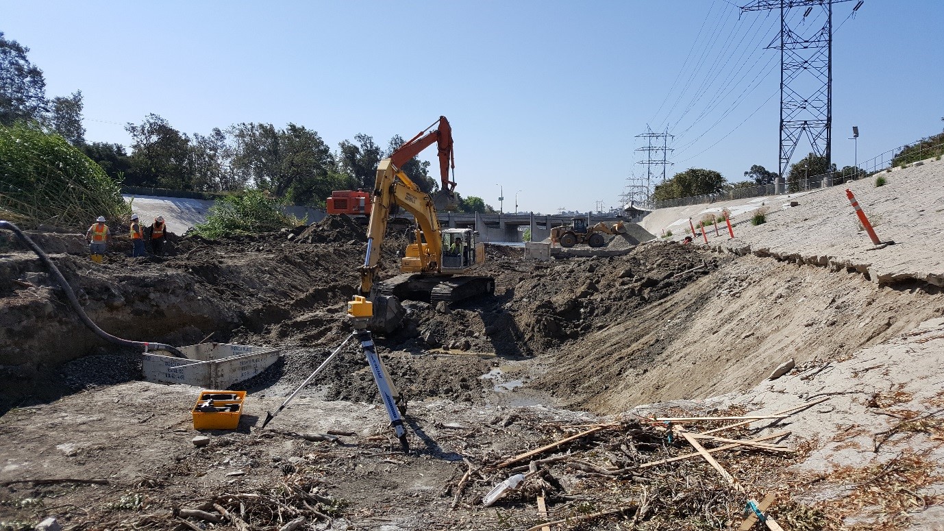 Excavation being restored to original line, grade, and elevation