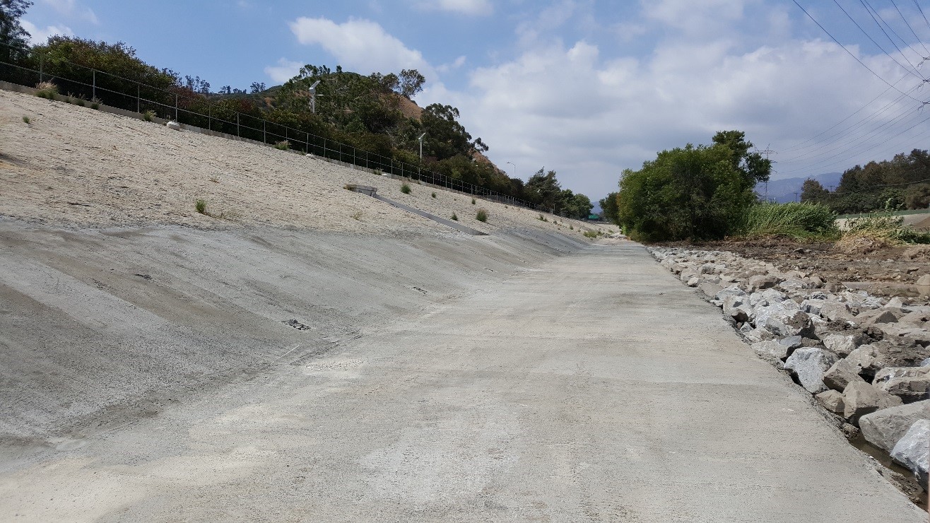 derrick stone protects grouted stone toe
